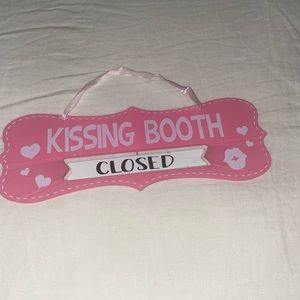 Kissing Booth pink and vintage sings.